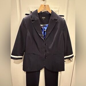 M&S - Navy Women’s Suit with white ribbon accents.